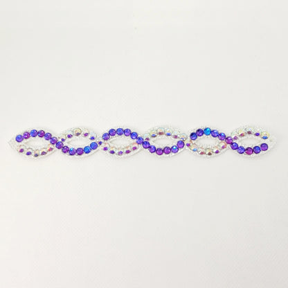 Gymnastique Rythmique - Couronne à chignon argenté - "Torsade" - Strass Aurore Boréale et Violet Boréale